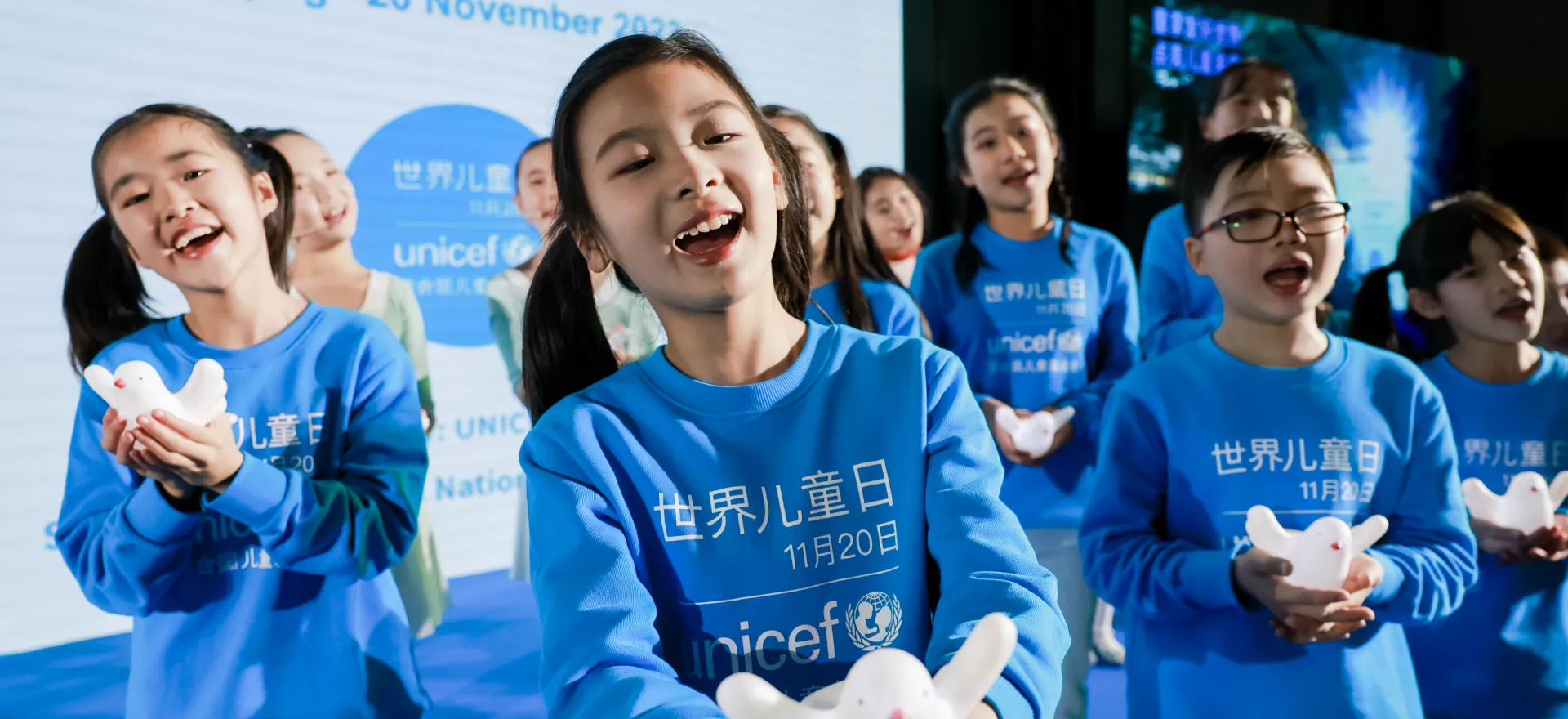 Children from the China National Children's Center perform the World Children's Day theme song ‘In the Future’ created by UNICEF Ambassador Wang Yuan during the World Children's Day event hosted by UNICEF China in Beijing on 20 November 2023.