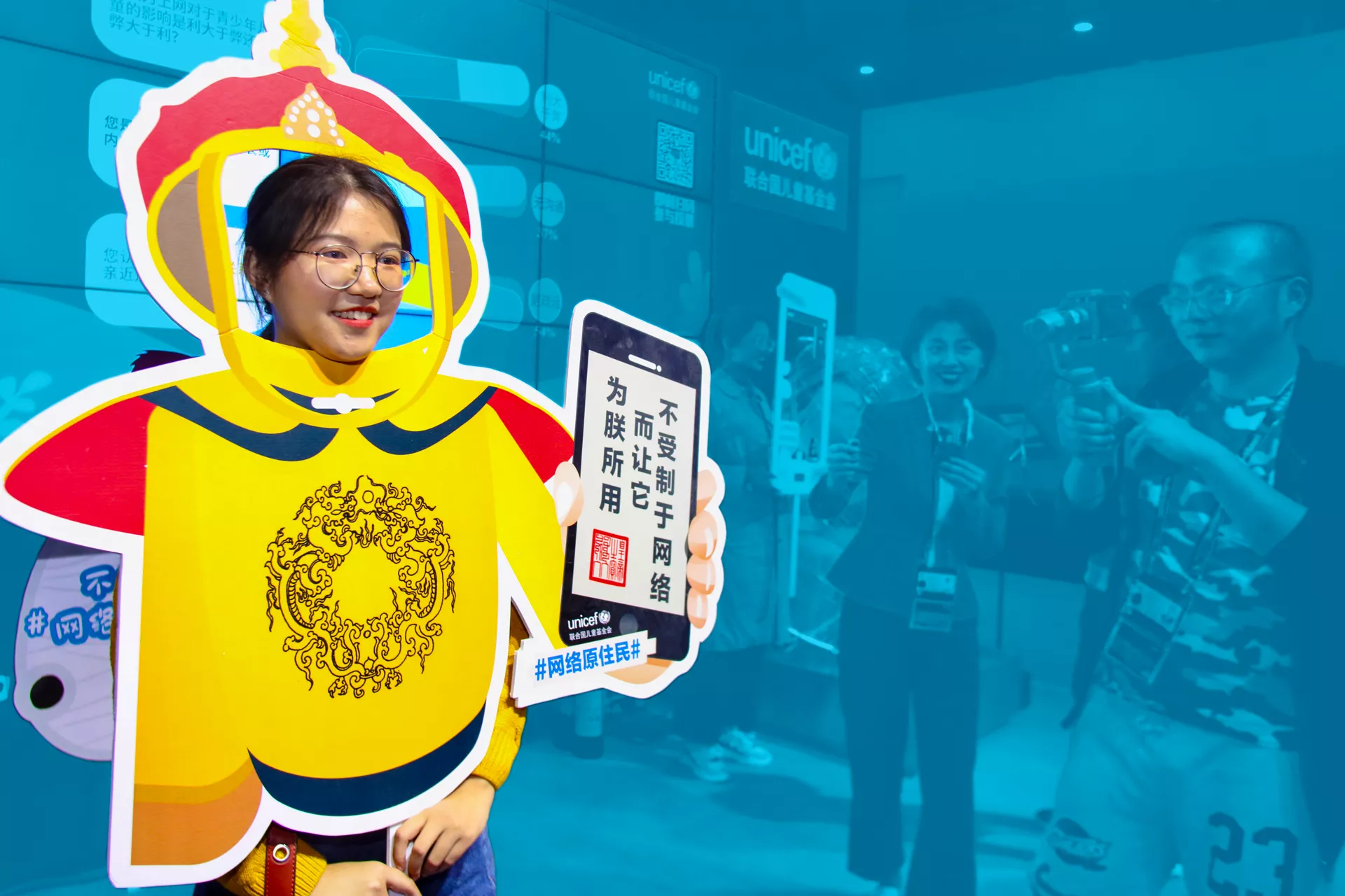 Media crew reports live from UNICEF’s exhibition booth at the World Internet Expo in Wuzhen, China, in November 2018.