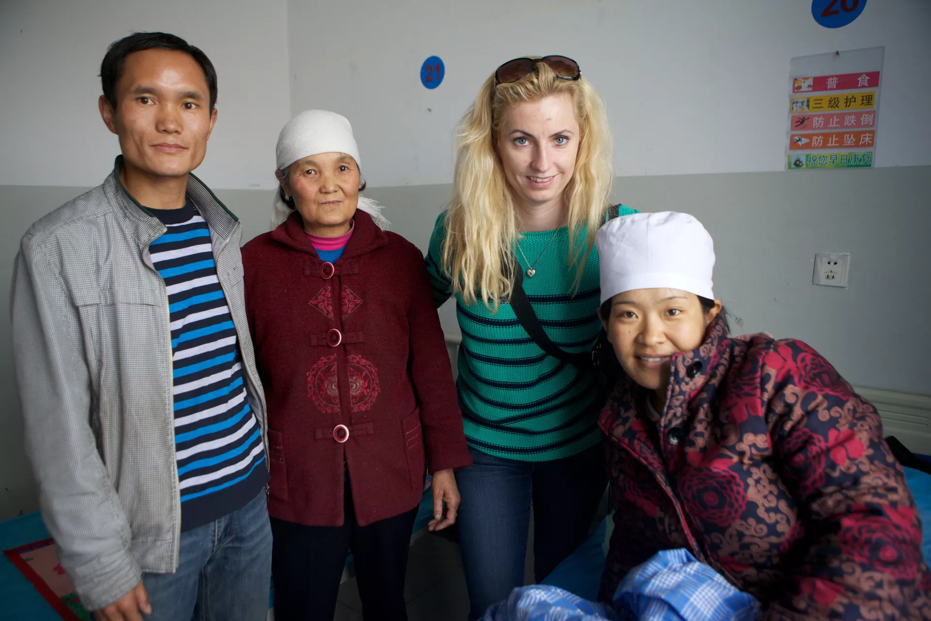 Jovita Majauskaite of the Lithuanian National Committee visits a maternity waiting room in Qinghai Province.