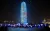 2023年11月19日，在河南省郑州市，孩子们拿着蓝色的星星灯，在以蓝色点亮的绿地中心·千玺广场前，庆祝世界儿童日。