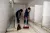Two students clean the toilet in Xianlong Primary School in Zhong County, Chongqing, China.