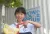 A student demonstrates what is healthy food outside UNICEF China’s ‘Know Your Food’ Convenience Store at the Enshi Experimental Primary School in Enshi, Hubei Province, on 20 May 2022.