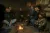 2015年1月15日，在四川省凉山彝族自治州昭觉县跳坝村的一户村民家里，联合国儿童基金会驻东亚及太平洋地区主任丹尼尔·图尔（Daniel Toole）和联合国儿童基金会驻华代表麦吉莲（Gillian Mellsop）与这家人围坐在火堆旁。