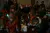 2015年1月15日，在四川省凉山彝族自治州昭觉县木渣洛村的儿童之家，联合国儿童基金会驻东亚及太平洋地区主任丹尼尔•图尔（Daniel Toole）和联合国儿童基金会驻华代表麦吉莲（Gillian Mellsop）坐在当地儿童中间。