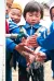 甘肃地震灾区的孩子们使用联合国儿童基金会援建的供水系统和卫生厕所。
