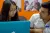 Youth volunteer and UNICEF staff member discuss project objectives in UNICEF Beijing office, on 30th June 2019.