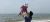 A father holds his daughter in Qinhuangdao, Hebei Province, in 2019.