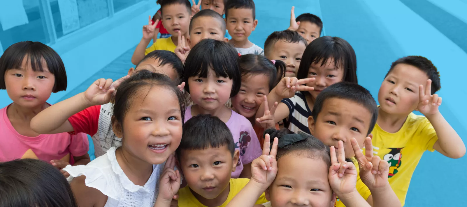 Preschool children are photographed at a kindergarten in Tongren, Guizhou Province.