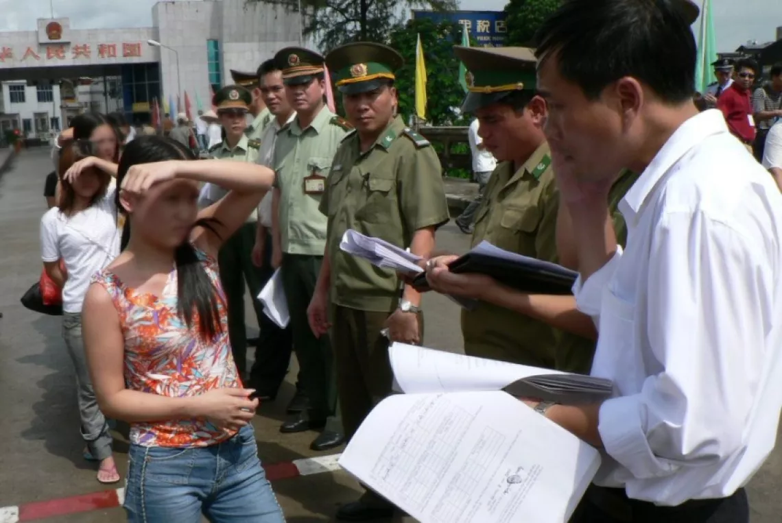Trafficked Vietnamese girls being repatriated at the Sino-Vietnam border in Guangxi Province.