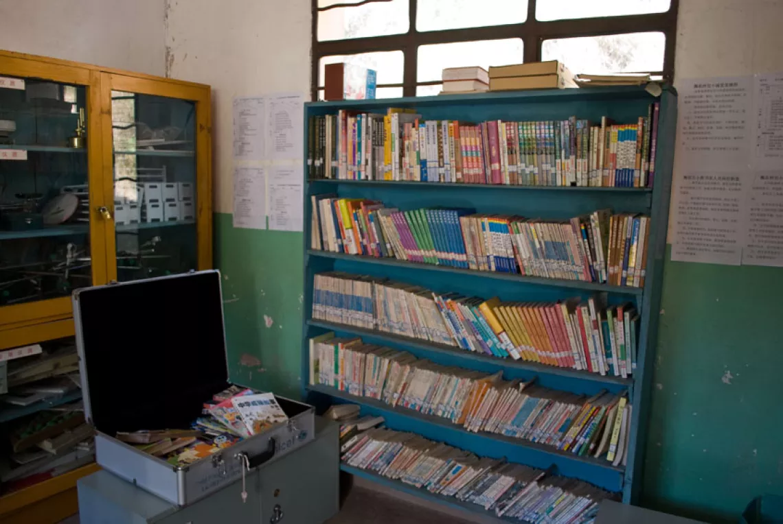 The school library holds books donated by UNICEF and by individuals.