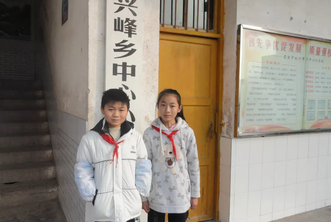 Zou Mengyang (left) and Fan Yaoyao, 6th grade students at Xingfeng Primary School, Zhong County, Chongqing.