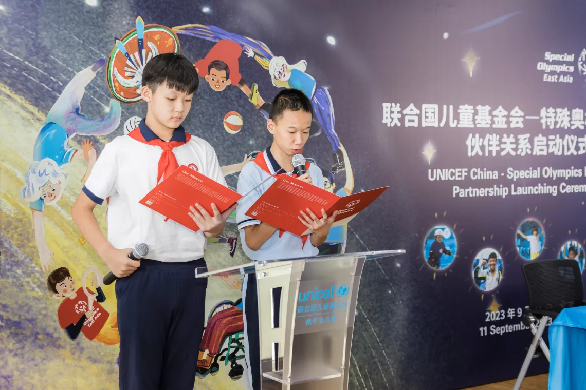 Special Olympics Unified Peers Li Zhengze (left) and Chen Rui host the event.