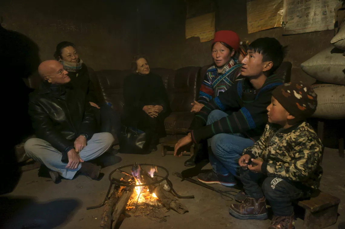 Daniel Toole (1st from left), UNICEF Regional Director for East Asia and the Pacific, and Gillian Mellsop, UNICEF's Representative to China, visit a rural household in Tiaoba Village, Zhaojue County, Liangshan, Sichuan Province, China on January 15, 2015.
