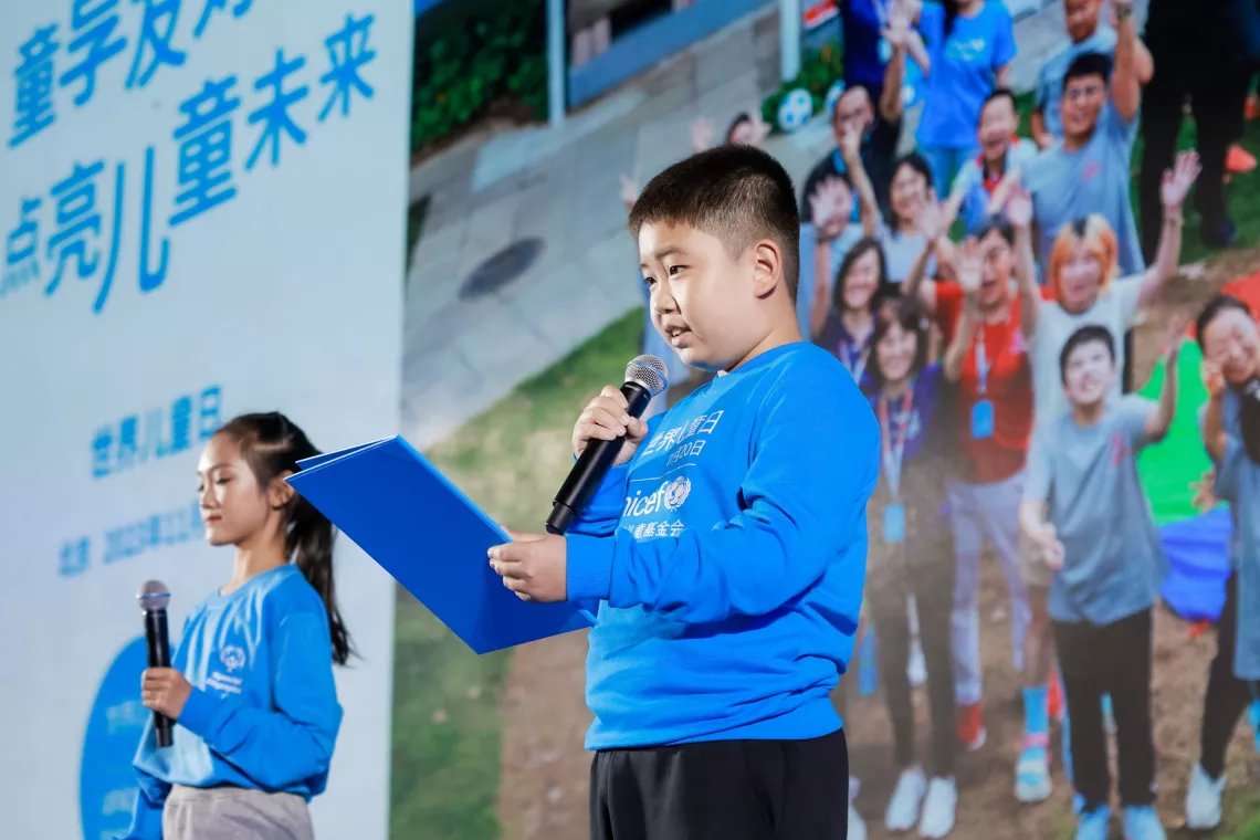 Zhang Xuanshuo (right) and Chen Zu'er from Beijing share their experience joining a UNICEF-Special Olympic inclusive sports activity during the World Children's Day event hosted by UNICEF China in Beijing on 20 November 2023.
