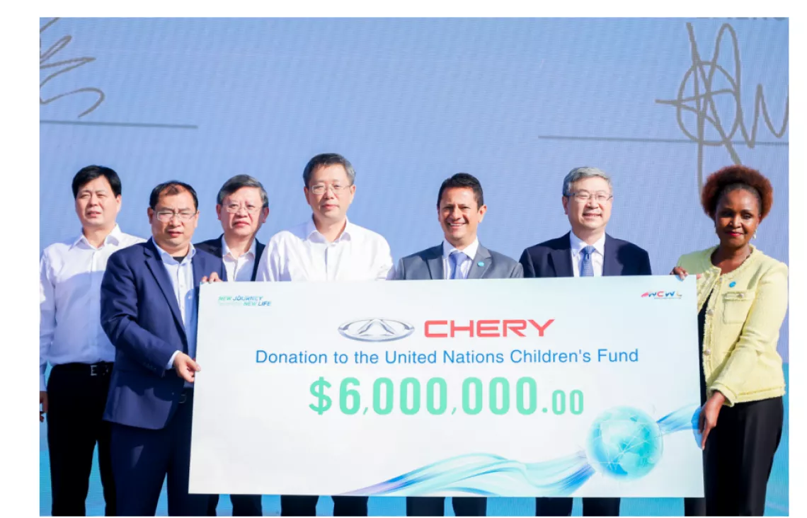 17 October 2023, Mr. Zhang Guibin (first from the left), President of Chery International  and Ms. Amakobe Sande, UNICEF Representative to China  (First from the right) UNICEF announced a new global partnership between Chery Automobile and UNICEF.