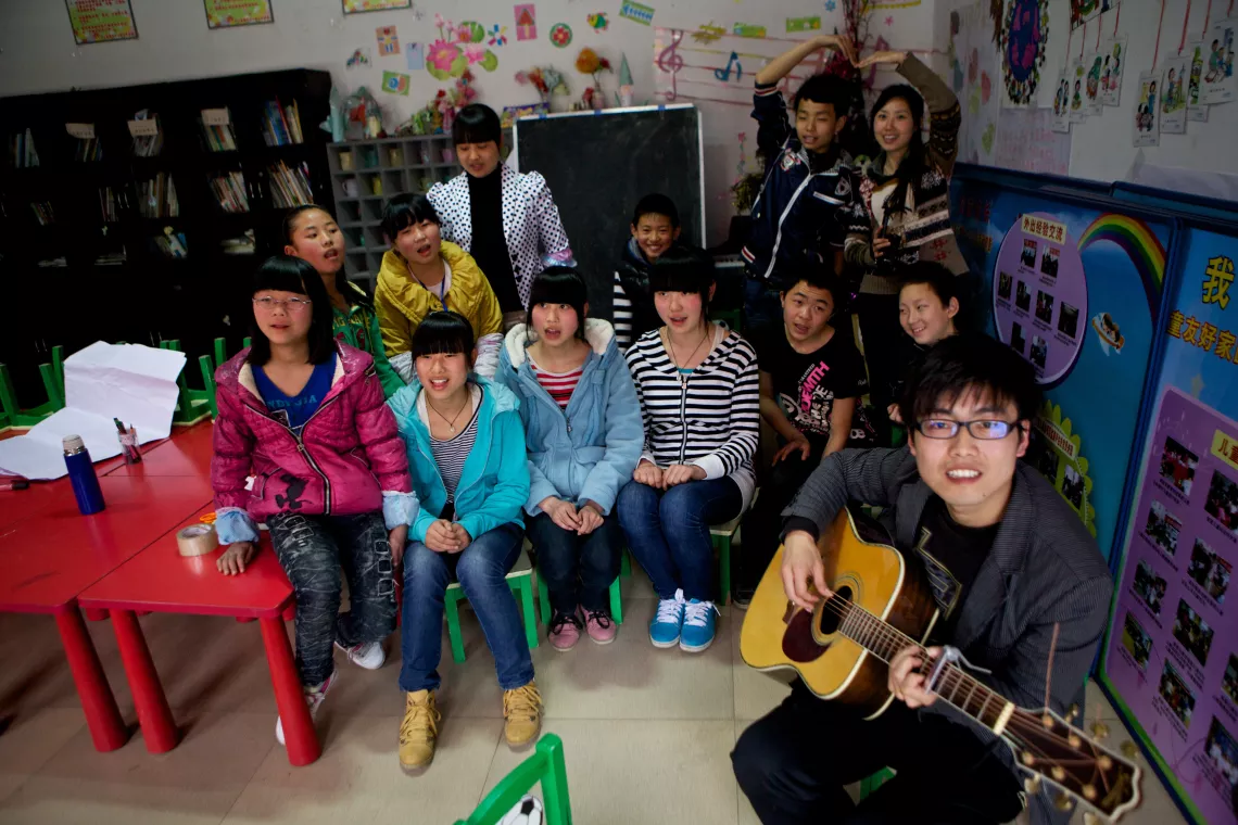 Child Friendly Space volunteer Yu Yanyong (right) has written a song for the Hengxi CFS. He has formed a small choir and they enjoy performing regularly.