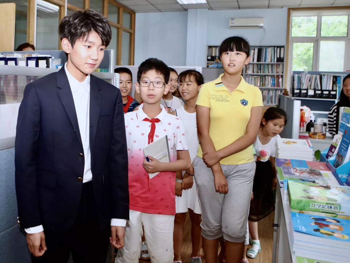 At the Education Section`s office, Wang Yuan and the children found a series of materials developed for education projects, including children`s books, textbooks developed to help strengthen rural students' social-emotional skills as well as recreational kits.