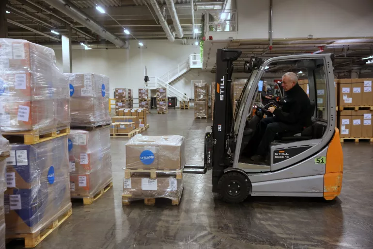 Personal Protective Equipment (PPE) including masks and protective suits are being packed and loaded in UNICEF’s global supply hub in Copenhagen on 28 January 2020.