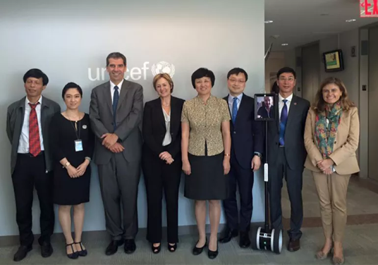 Dr Chen Xu (5th from left), Tsinghua University's Chairperson of University Council, meet with UNICEF Deputy Executive Director, Yoka Brandt (4th from left), Director of Communication, Paloma Escudero (1st from right), at UNICEF Headquarters in New York on 28th August, 2015. 
