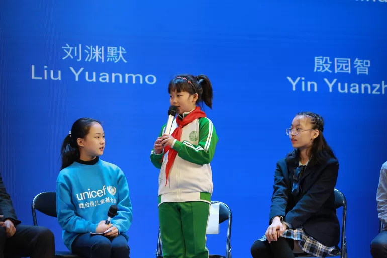 Mu Yuxuan (standing), 9 years old, speaks at a panel discussion during the ‘Climate Change: Youth in Action’ forum in Beijing on 20 November 2020. Held at the China National Children’s Center, the forum was co-hosted by UNICEF, the All-China Youth Federation and the Ministry of Ecology and Environment in celebration of World Children’s Day. It aims to raise awareness of the environmental issues that most affect young people and hear their voices and solutions for change.
