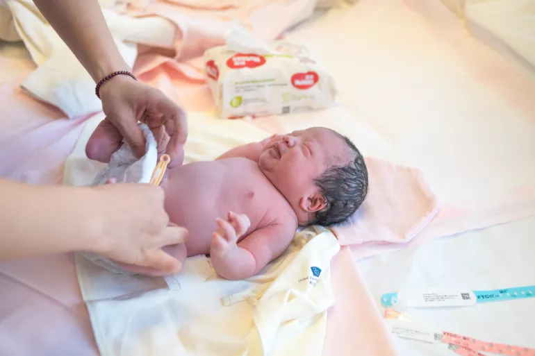 On 1 January 2019 in China, newborn baby girl Li Xin Yao has her first diaper change.
