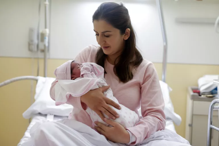 [NOTE: This is a file photo] On 1 January 2019 in Spain, newborn baby girl Sofia Karapetyan with her mother Lilit Grigoryan poses at the Vall d’Hebron Barcelona Hospital Campus in Barcelona.