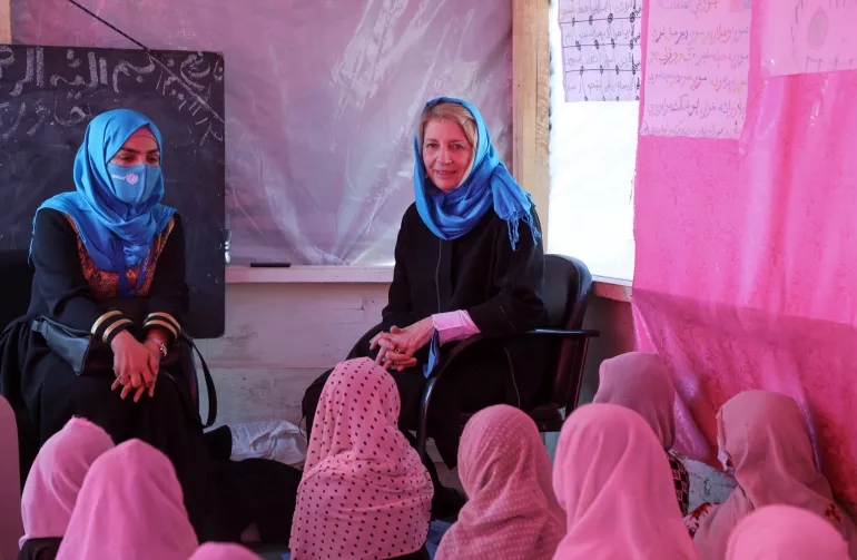 On 24 February 2022, UNICEF Executive Director, Catherine Russell, talks to girls attending classes at a UNICEF-supported community-based school in Kandahar’s Dand district.