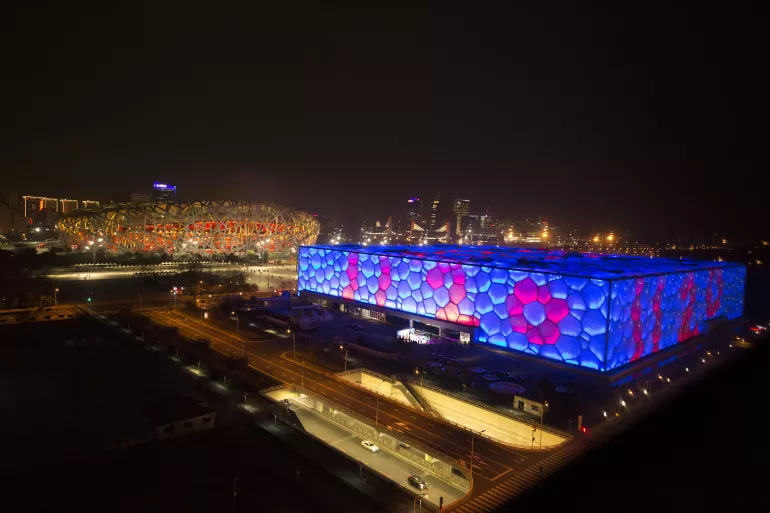 The bubbles of the National Aquatics Centre (also known as the Water Cube) are lit up in Beijing on 20 November 2018 to celebrate World Children's Day.