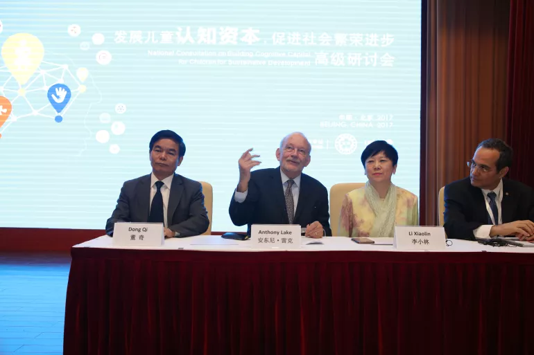 Anthony Lake (second from left), UNICEF Executive Director, Li Xiaolin (second from right), President of the Chinese People's Association for Friendship with Foreign Countries (CPAFFC), Prof. Dong Qi (left), President of the Beijing Normal University, and Martin Burt (right), an international public policy expert, attend the opening session of the National Consultation on ‘Building Cognitive Capital for Children' for Sustainable Development in Beijing on 16 May, 2017. 
